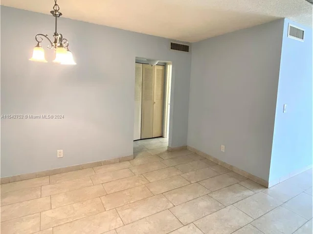 1465 NE 123rd St # 302, North Miami FL 33161