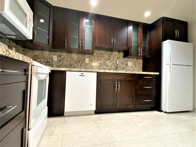 1465 NE 123rd St # 302, North Miami FL 33161