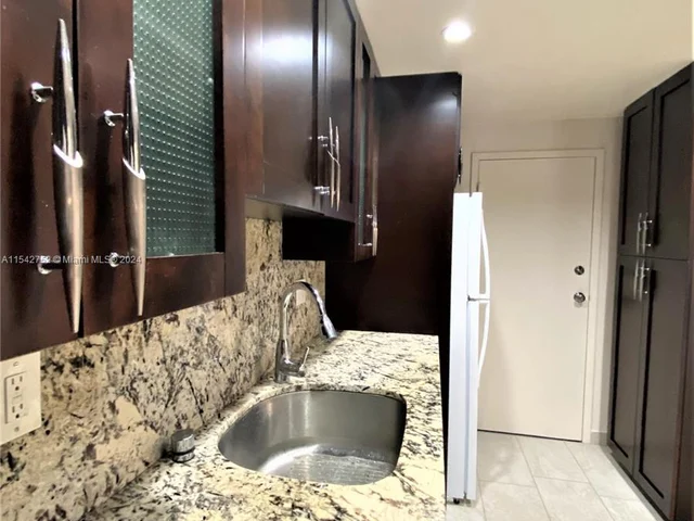 1465 NE 123rd St # 302, North Miami FL 33161