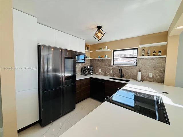 4000 NE 170th St # 400, North Miami Beach FL 33160