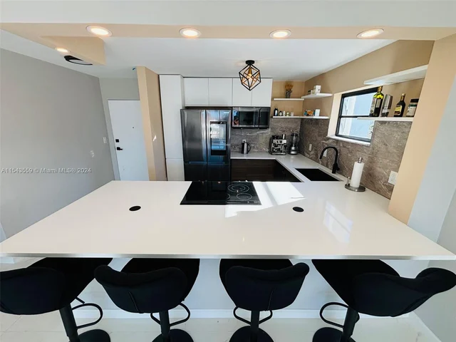 4000 NE 170th St # 400, North Miami Beach FL 33160