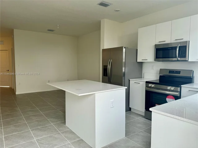 12154 NW 24 CT, Miami FL 33167