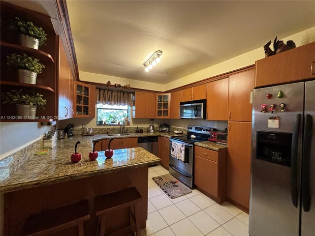 16251 Golf Club Rd # 302, Weston FL 33326