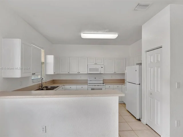 13326 SW 128th Psge, Miami FL 33186