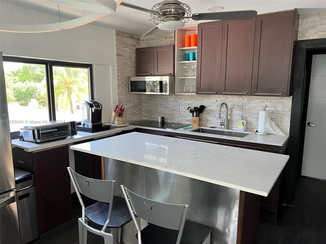 168 NW 53rd St # 3, Miami FL 33127