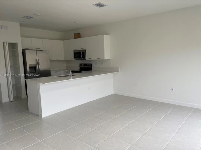 12179 NW 23th Court, Miami FL 33167