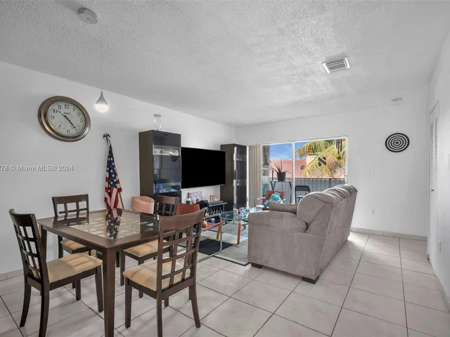 1126 NW 125th Path # 203, Miami FL 33182