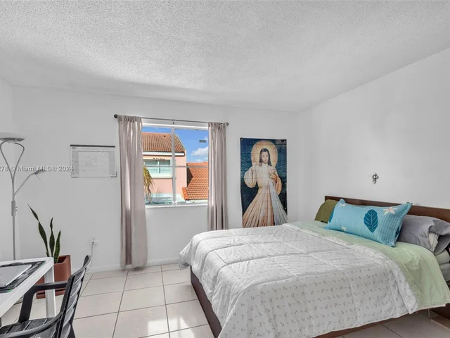 1126 NW 125th Path # 203, Miami FL 33182