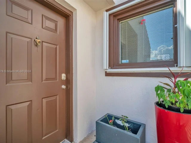 1126 NW 125th Path # 203, Miami FL 33182