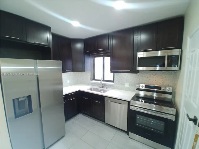 940 NW 47 Street, Miami FL 33127