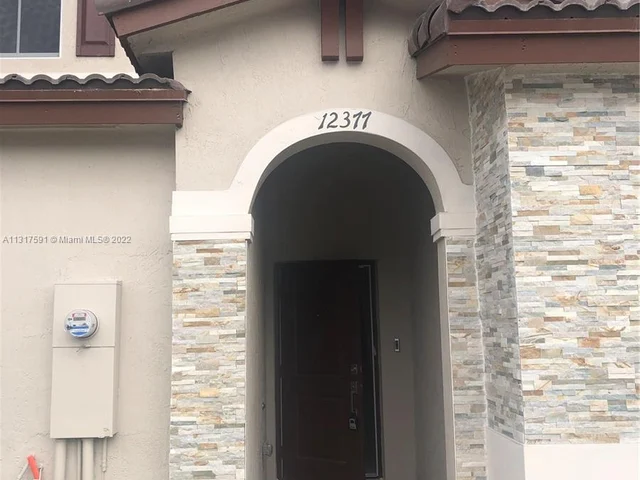 12377 NW 23rd Court, Miami FL 33167