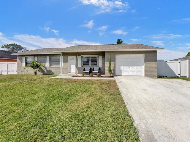 145 Cortes Ave, Royal Palm Beach FL 33411