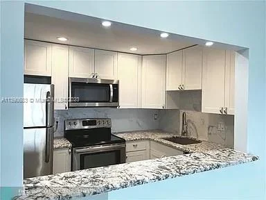 4174 Inverrary Dr # 810, Lauderhill FL 33319