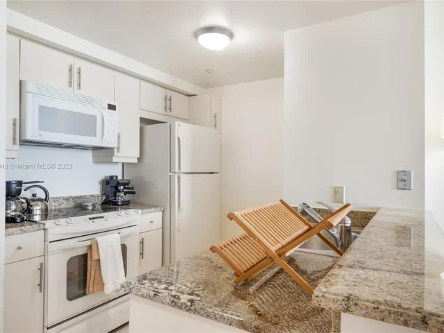 2889 Mcfarlane Rd # 1813, Miami FL 33133