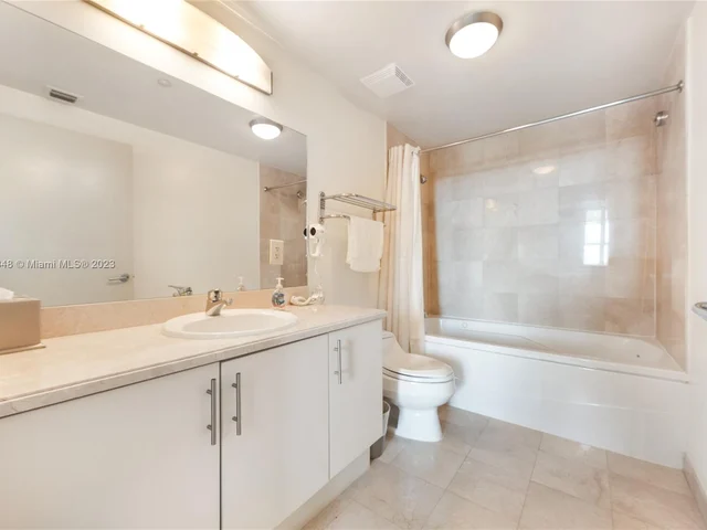 2889 Mcfarlane Rd # 1813, Miami FL 33133