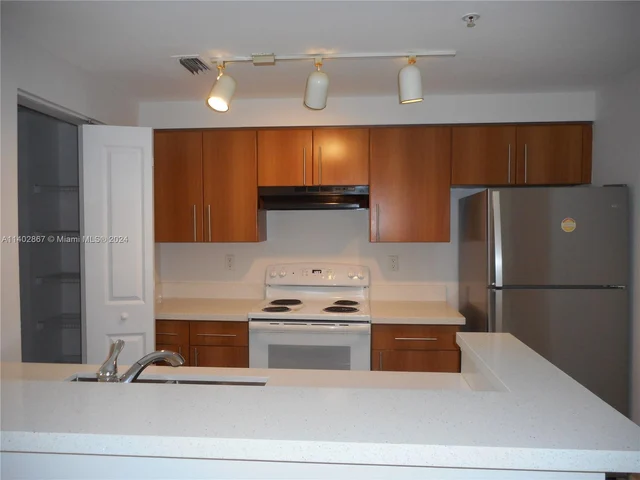 6020 W Sample Rd # 304, Coral Springs FL 33067