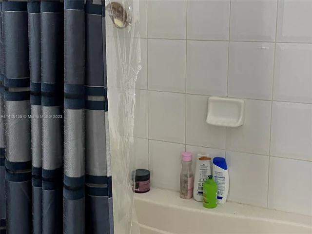 7950 N Nob Hill Rd # 104, Tamarac FL 33321