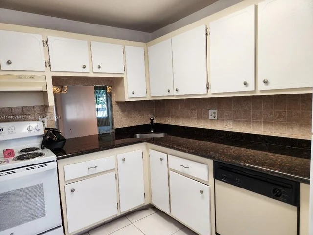 5801 NW 62nd Ave # 202, Tamarac FL 33319