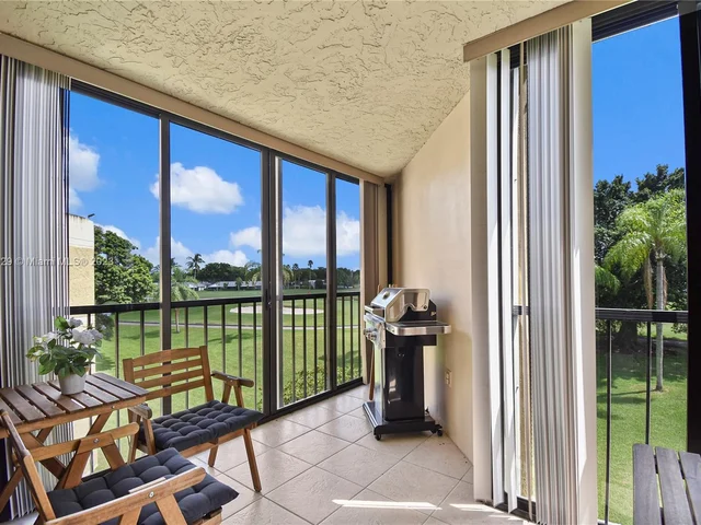 16200 Golf Club Rd # 305, Weston FL 33326