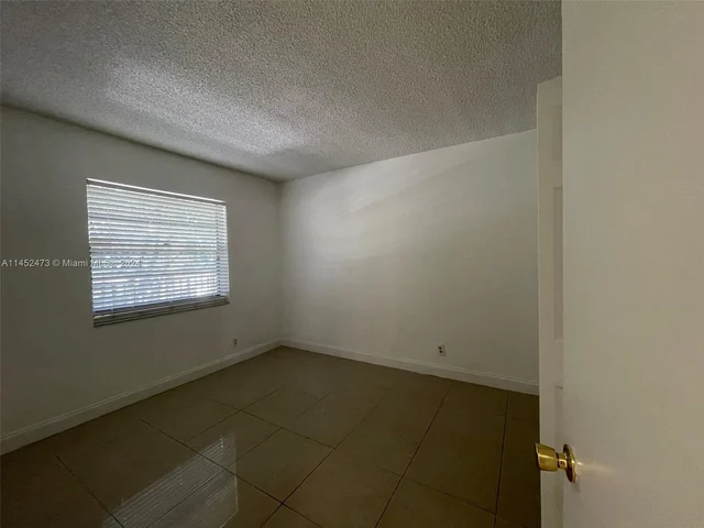 10501 W Broward Blvd # 303, Plantation FL 33324