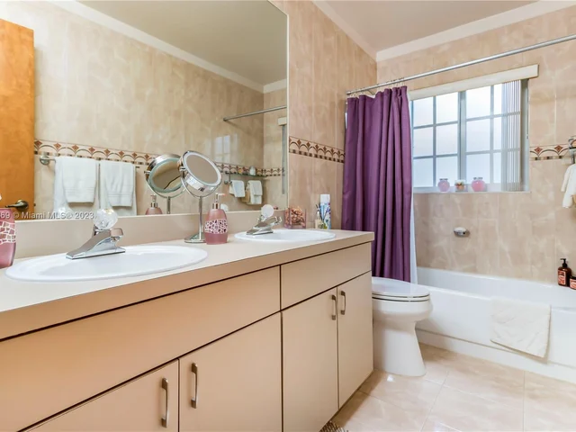 695 NW 107th Ln, Coral Springs FL 33071