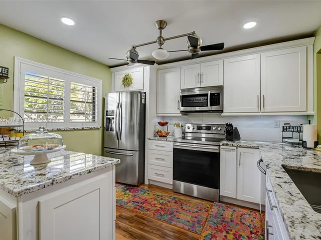 6080 N Sabal Palm Blvd # 203, Tamarac FL 33319