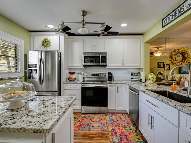 6080 N Sabal Palm Blvd # 203, Tamarac FL 33319