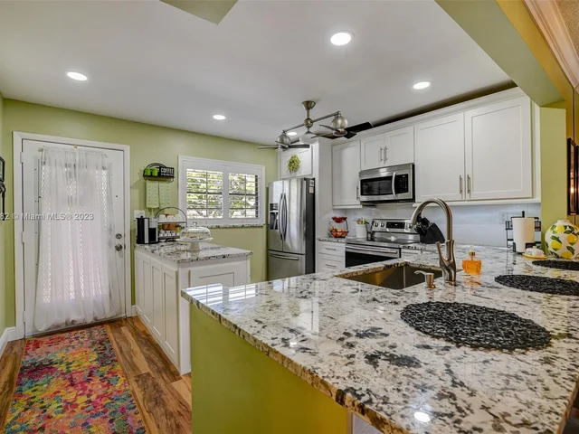 6080 N Sabal Palm Blvd # 203, Tamarac FL 33319