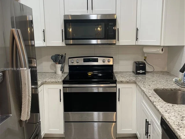 9091 Chrysanthemum Dr, Boynton Beach FL 33472