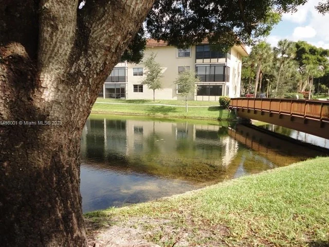 6090 N Sabal Palm Blvd # 208, Tamarac FL 33319