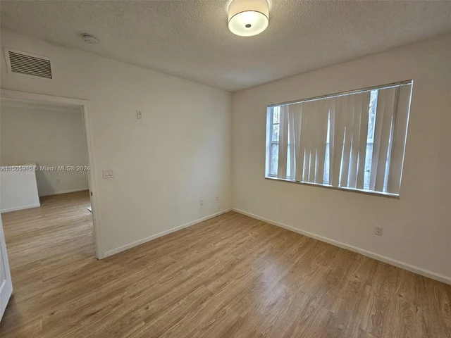 5960 W Sample Rd # 302, Coral Springs FL 33067