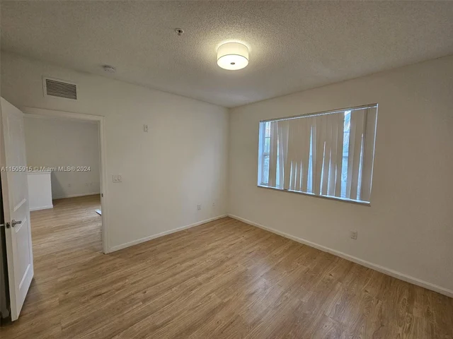 5960 W Sample Rd # 302, Coral Springs FL 33067