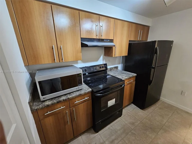 5960 W Sample Rd # 302, Coral Springs FL 33067