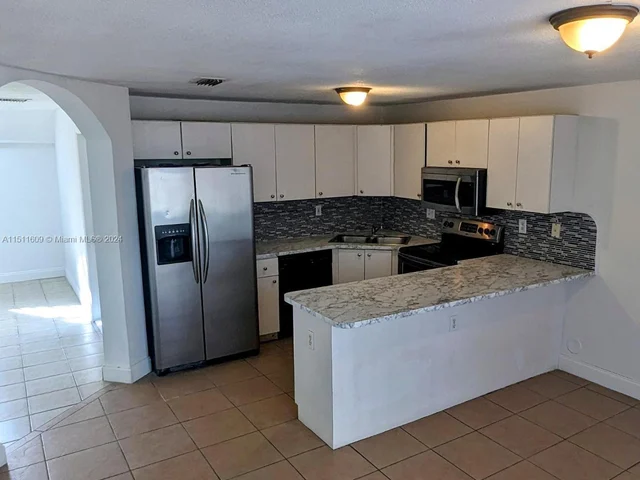 16011 SW 87th Ter, Miami FL 33193