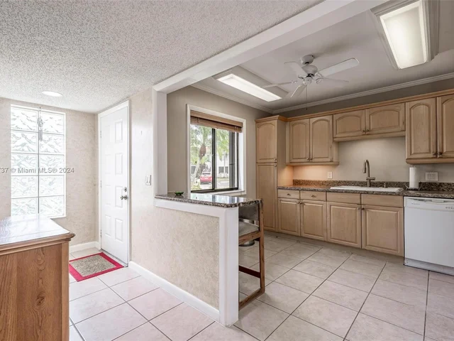 304 Racquet Club Rd # 101, Weston FL 33326