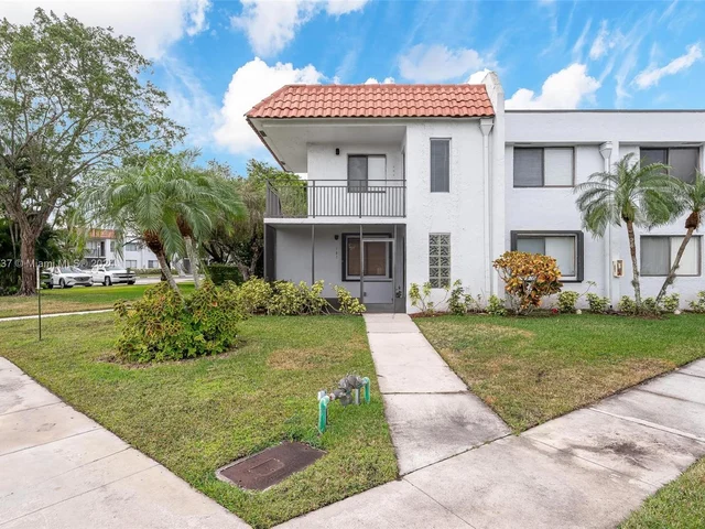 304 Racquet Club Rd # 101, Weston FL 33326