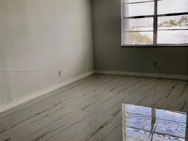 488 NW 165th St Rd # 409, Miami FL 33169