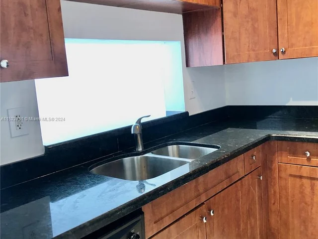 488 NW 165th St Rd # 409, Miami FL 33169