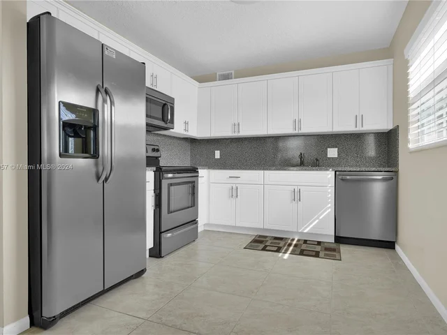 251 SW 132nd Way # 118H, Pembroke Pines FL 33027