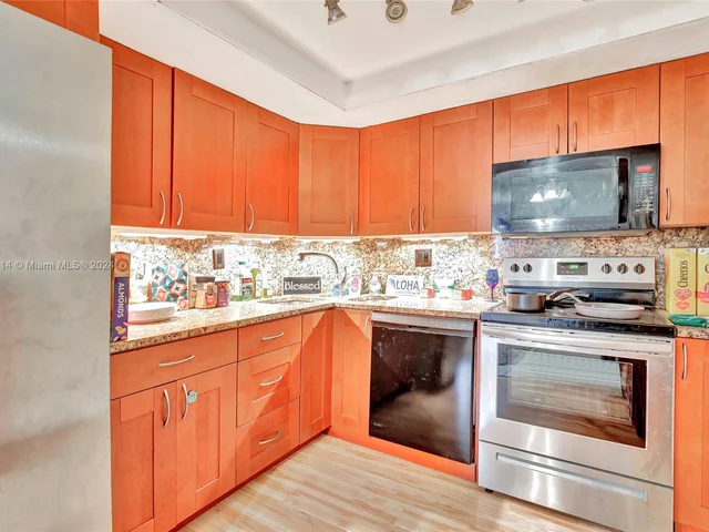 100 Golden Isles Dr # 114, Hallandale Beach FL 33009