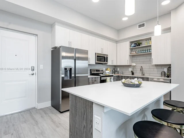 9375 W COMMERCIAL BLVD # 401, Tamarac FL 33351