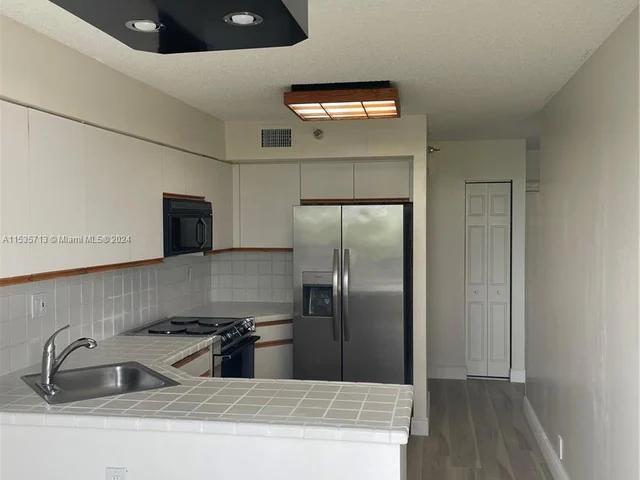 3530 Mystic Pointe Dr # 414, Aventura FL 33180