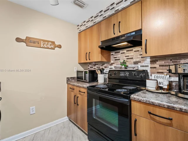 5980 W Sample Rd # 205, Coral Springs FL 33067