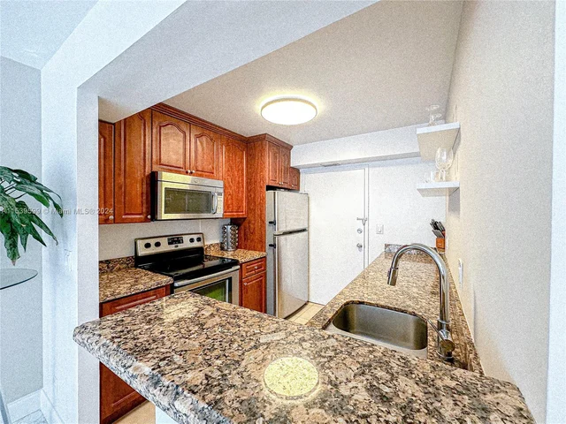 430 Golden Isles Dr # 205, Hallandale Beach FL 33009