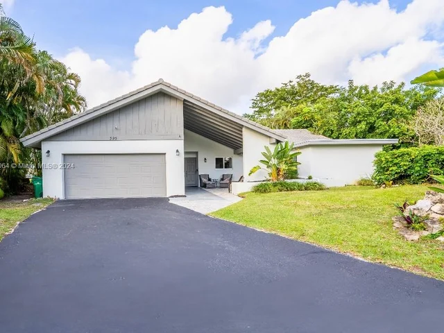 395 NW 89th Ln, Coral Springs FL 33071