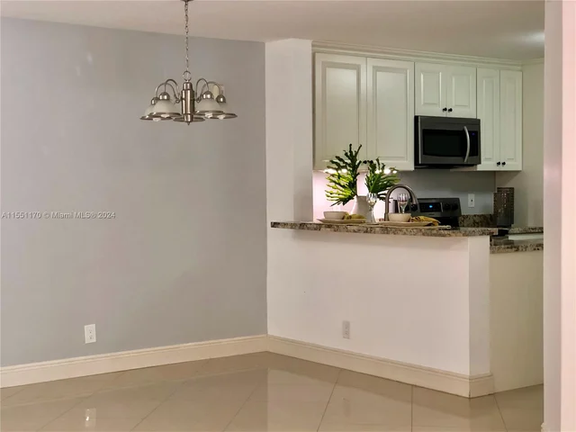 10141 W Sunrise Blvd # 203, Plantation FL 33322