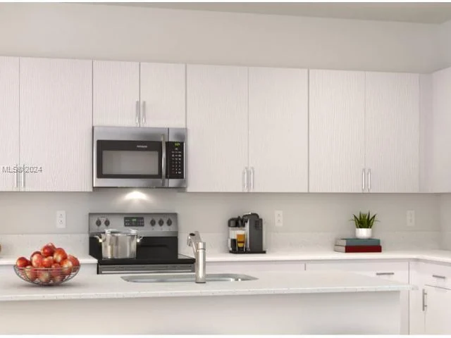 12148 NW 24TH PL, Miami FL 33167