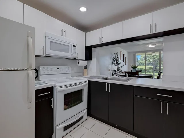 9470 Poinciana Place # 104, Davie FL 33324