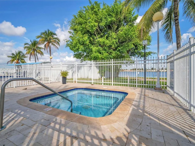 1126 NW 125th Path # 203, Miami FL 33182