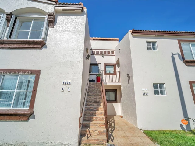 1126 NW 125th Path # 203, Miami FL 33182